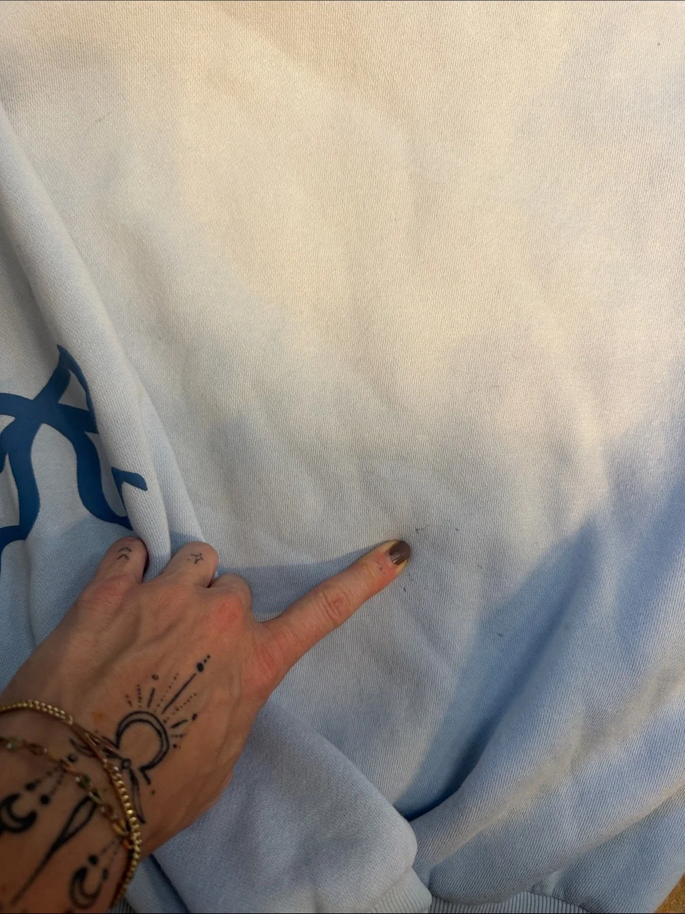 Edikted Light Blue Hoodie with Navy Bow Sleeve Graphics